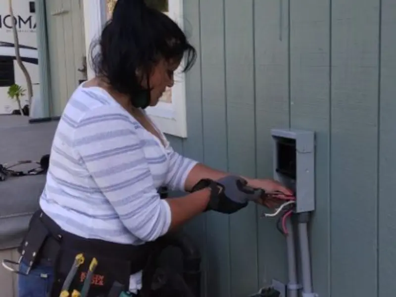 Licensed electrician wiring an exterior subpanel in Upper Nazareth